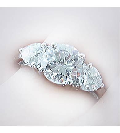 3 Stone Ring with Pear Side Diamonds