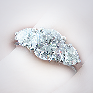 3 Stone Ring with Pear Side Diamonds